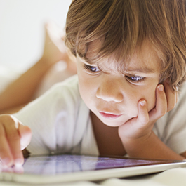 child with tablet